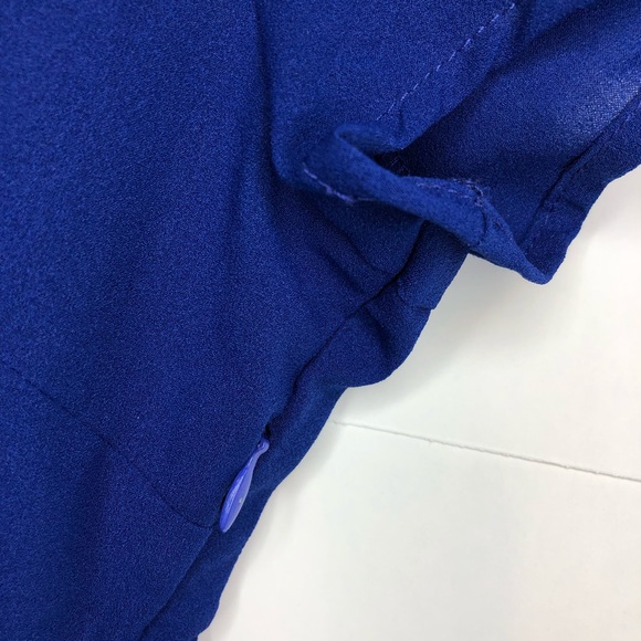 Peplum Shirt with Cut-Out Back - Picture 10 of 12